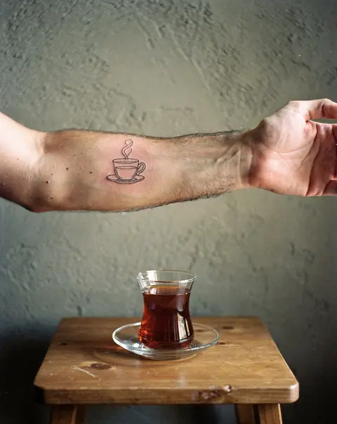Tea glass, inner forearm